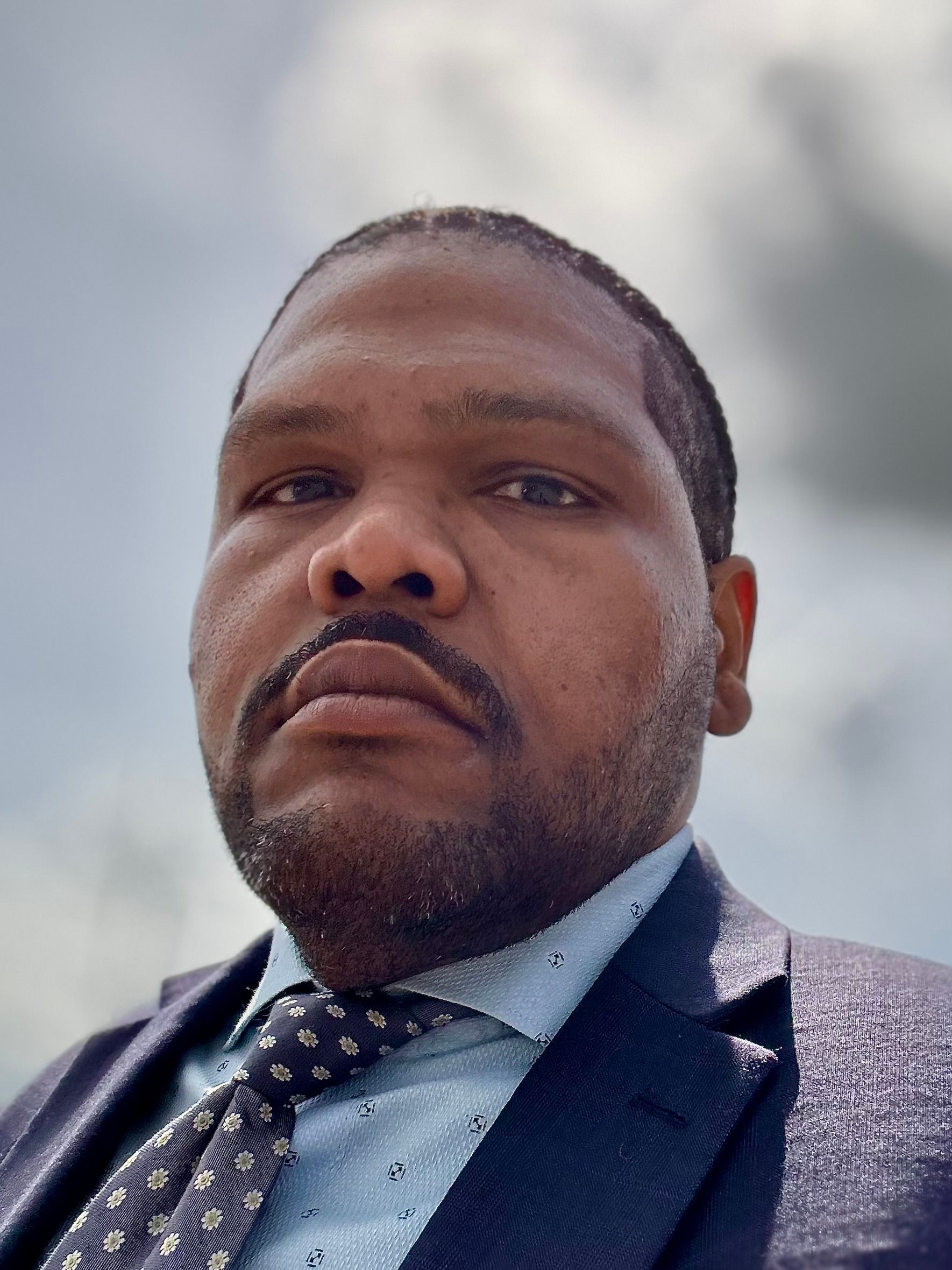 It is a silhouette of a person without a face.