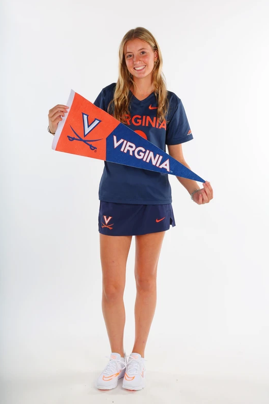 CAV Lax Elite athlete celebrates lacrosse commitment holding University of Virginia college flag