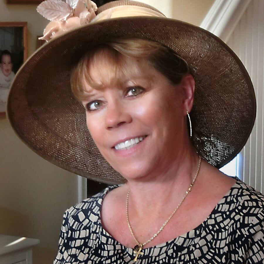 Smiling Woman With Fancy Hat — Tampa, FL — Bob Baggett Photography Inc