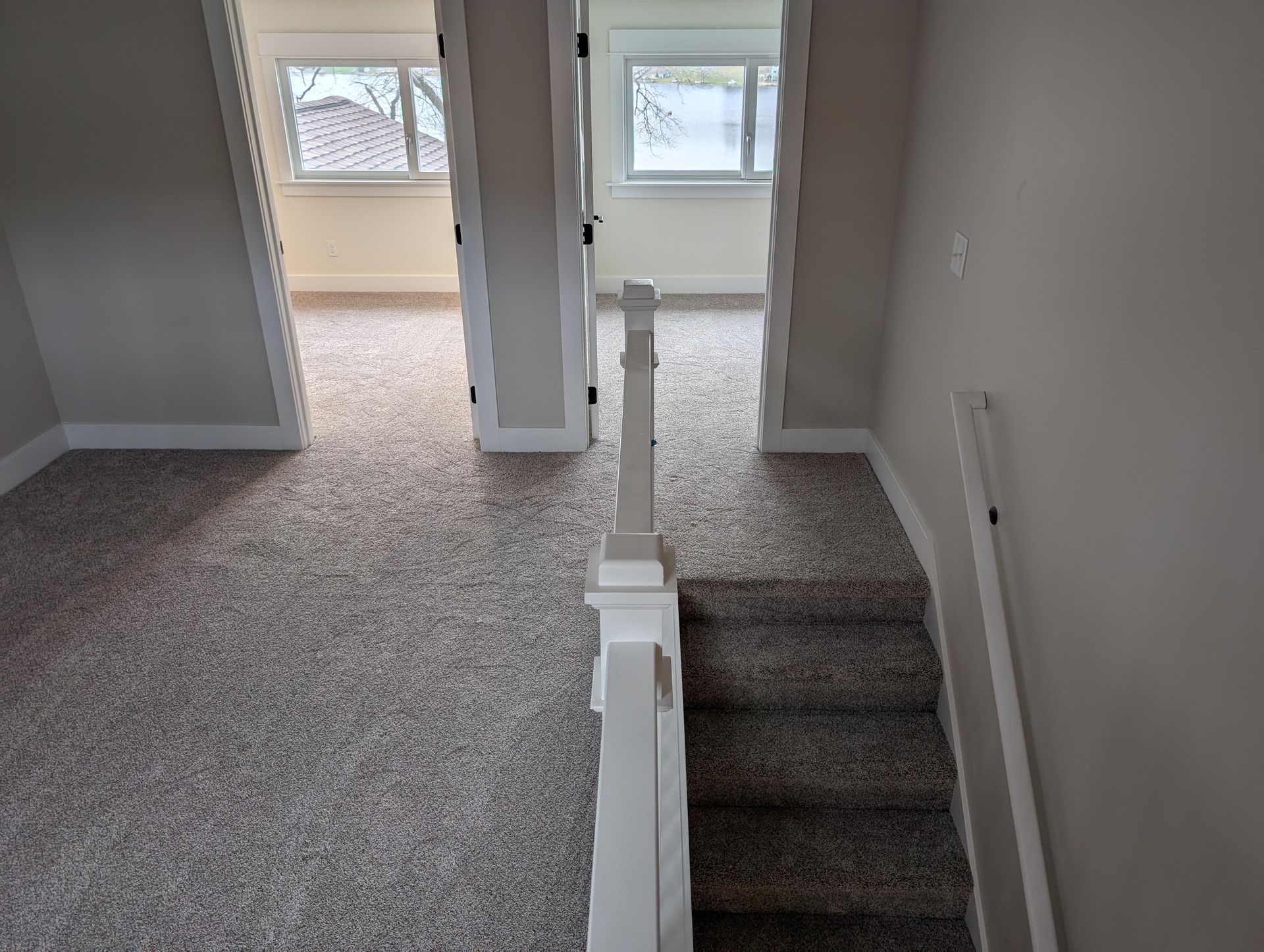 There is a staircase leading up to the second floor of a house.