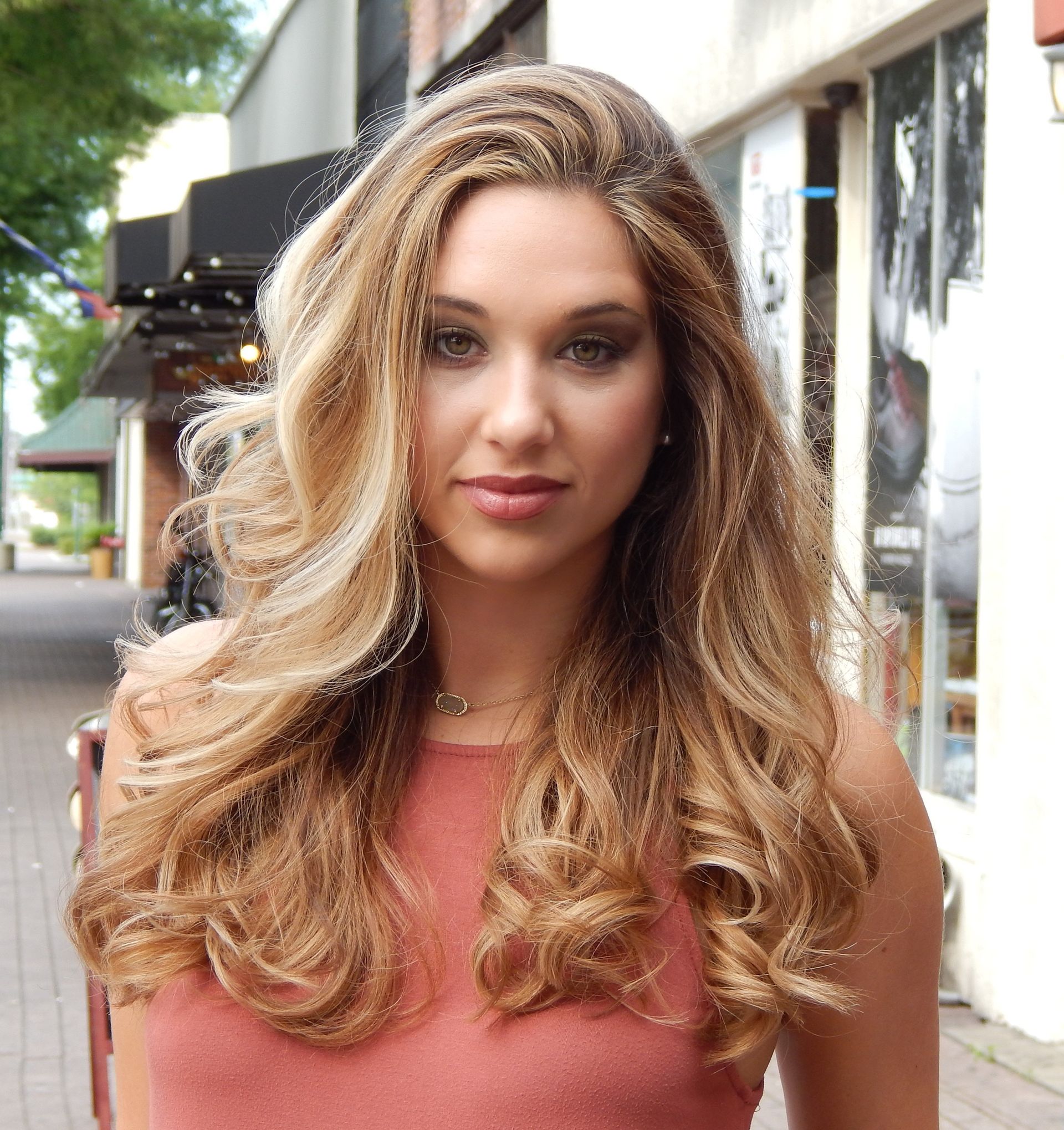 Women with Orange Dress— Lafayette, LA  — Frederick Hair Studio