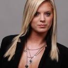 Women with Black Coat — Lafayette, LA  — Frederick Hair Studio