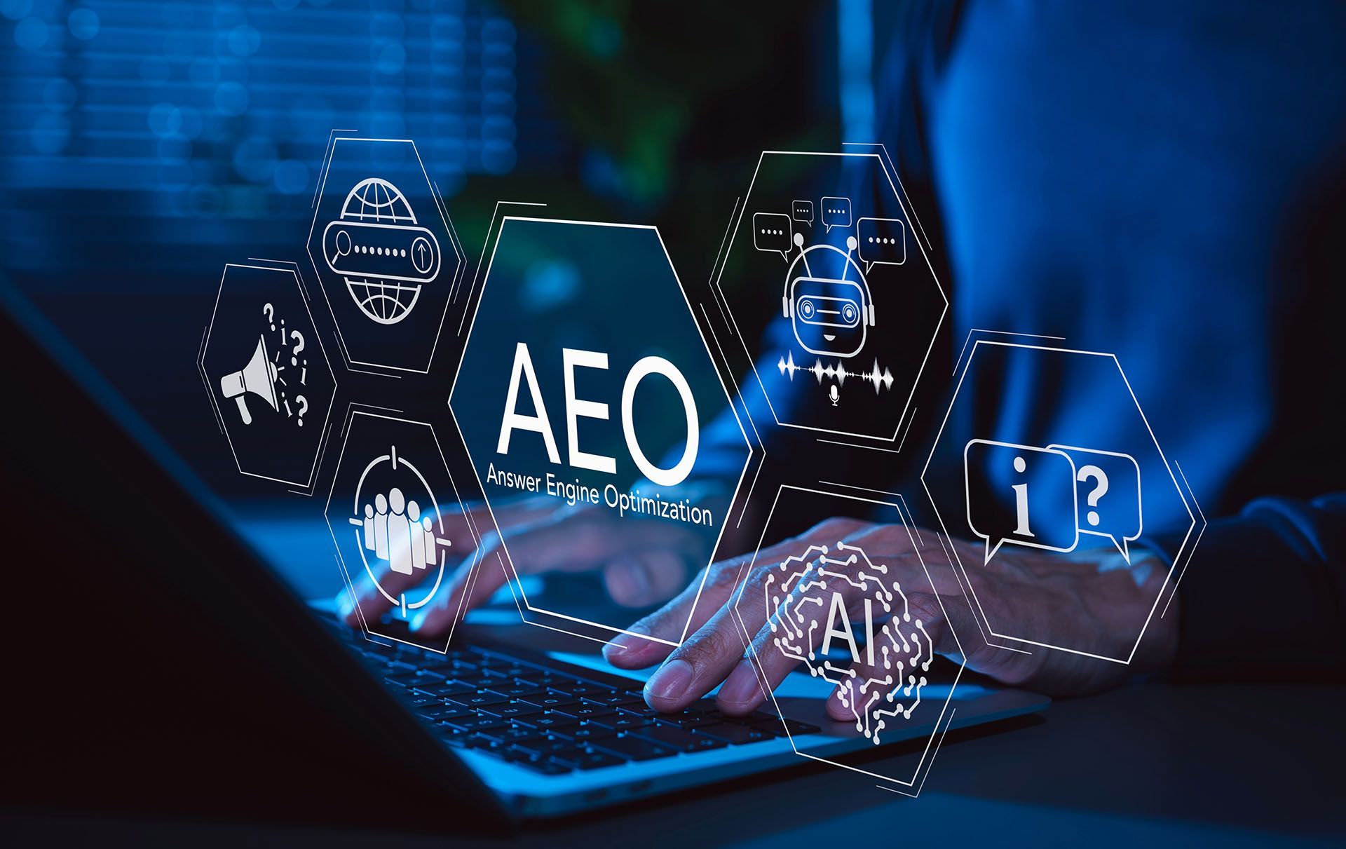 Person typing on laptop with AEO acronym and technology icons overlaid in a blue hue.