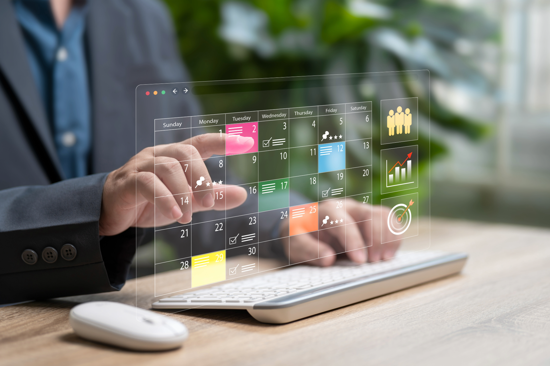 Person using a keyboard, interacting with a transparent screen displaying a digital calendar