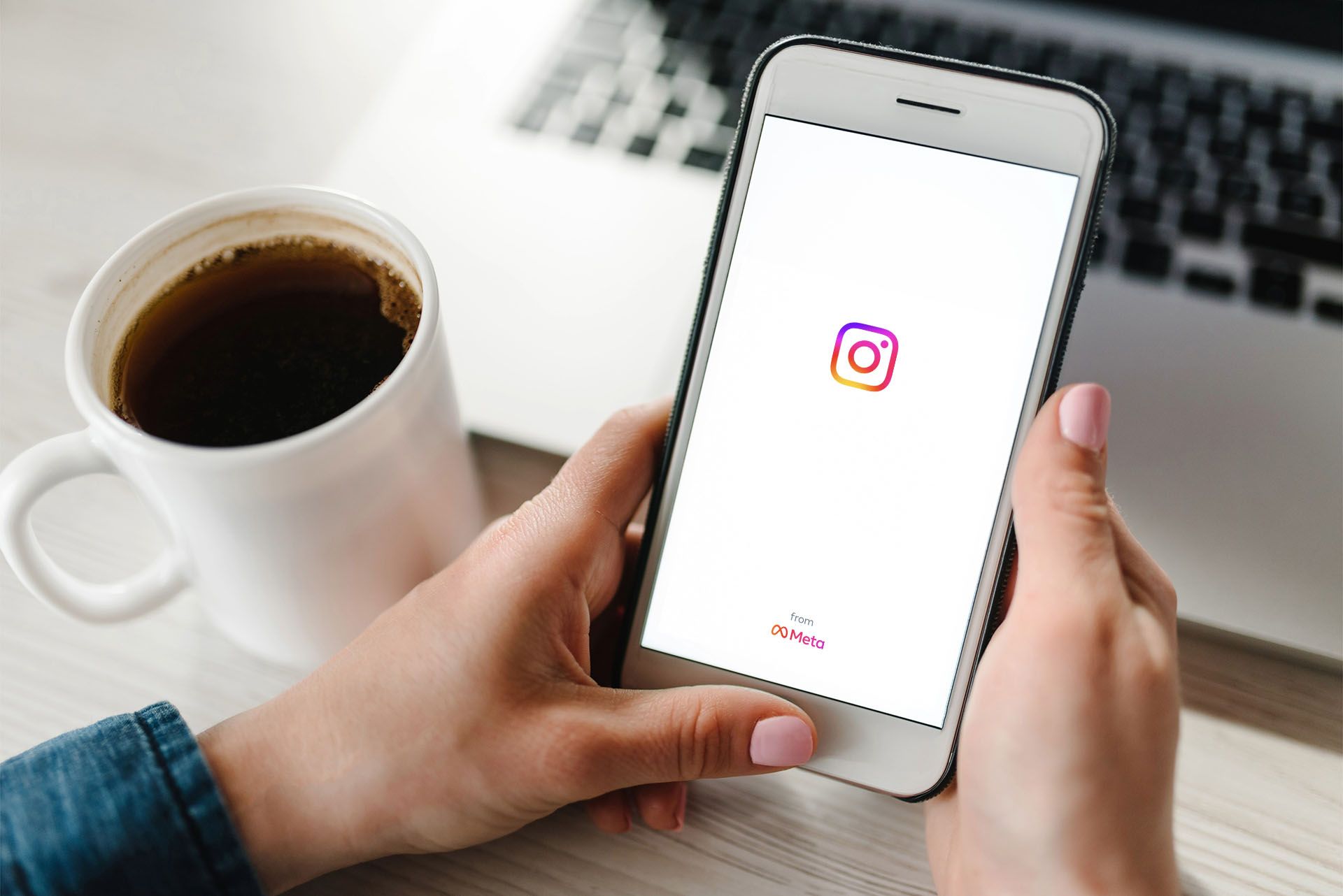 a person opening Instagram on their smartphone