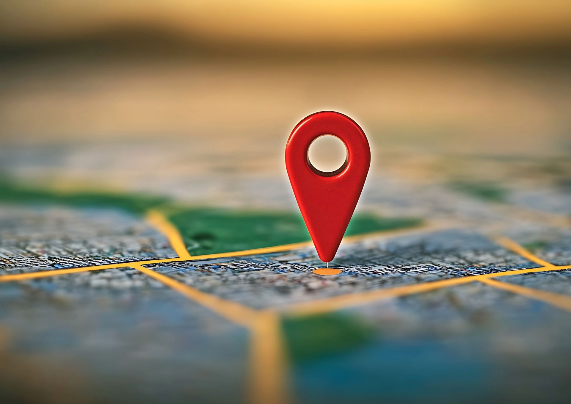 Red location marker pin on a map, indicating a destination.