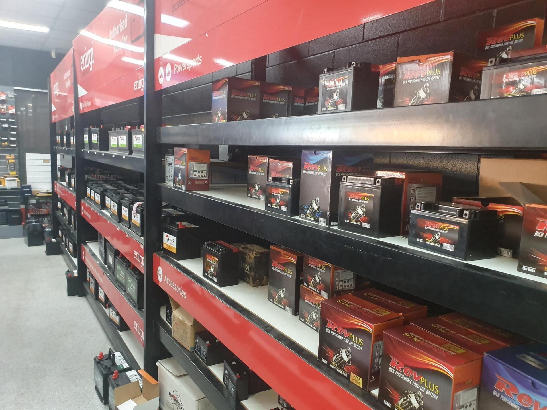 Vehicle Batteries Stack On Shelf — Atlas Super Store in Mount Isa, QLD