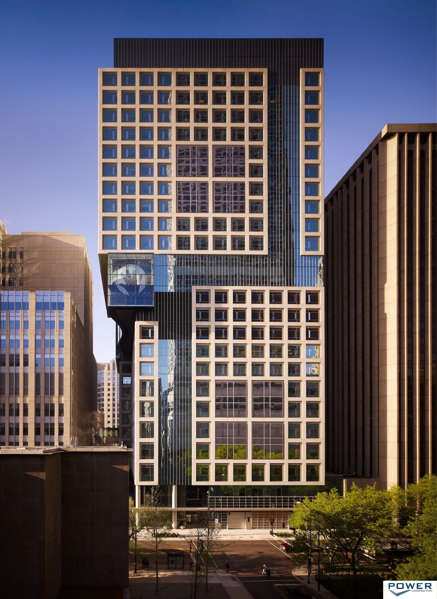 A very tall building with the word power on it