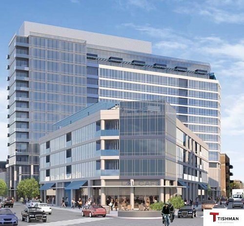 An artist 's impression of a tall building with a t on it