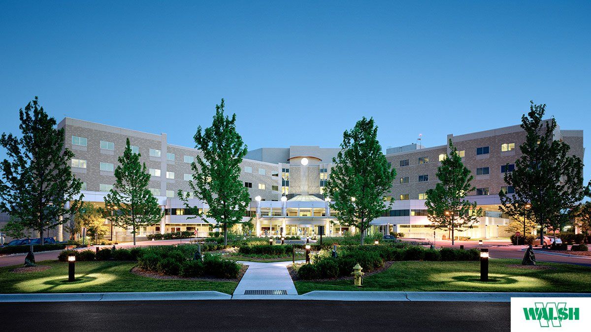 A large building with the word walsh on it