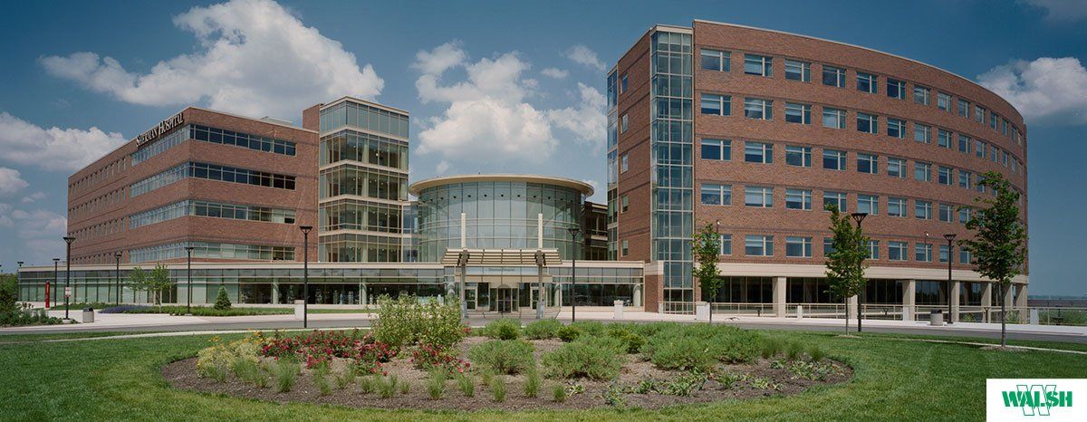 A large brick building with a lot of windows