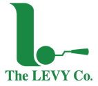 A green logo for the levy co. with a spoon and a ball.