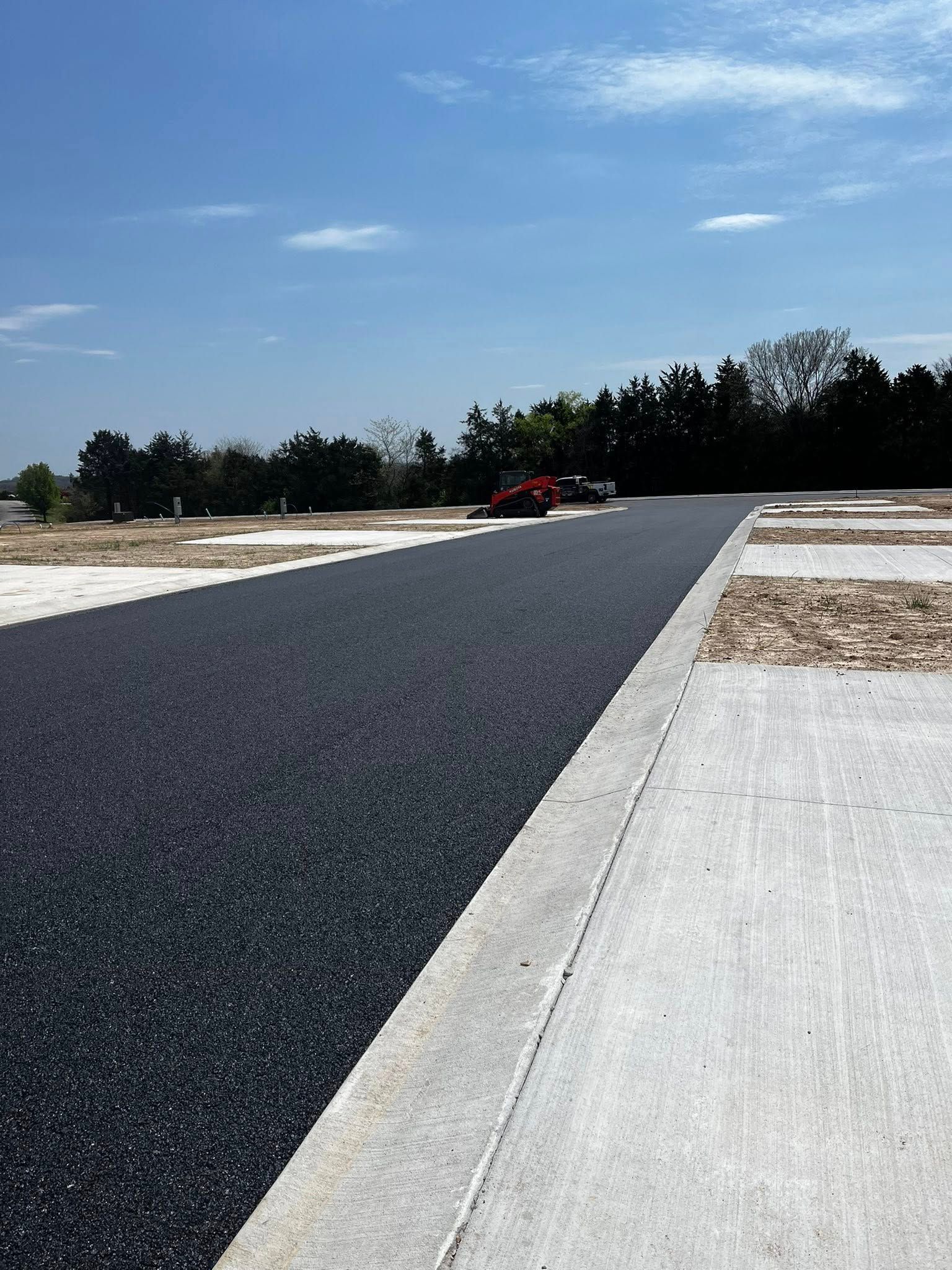 A road with a lot of gravel on the side of it
