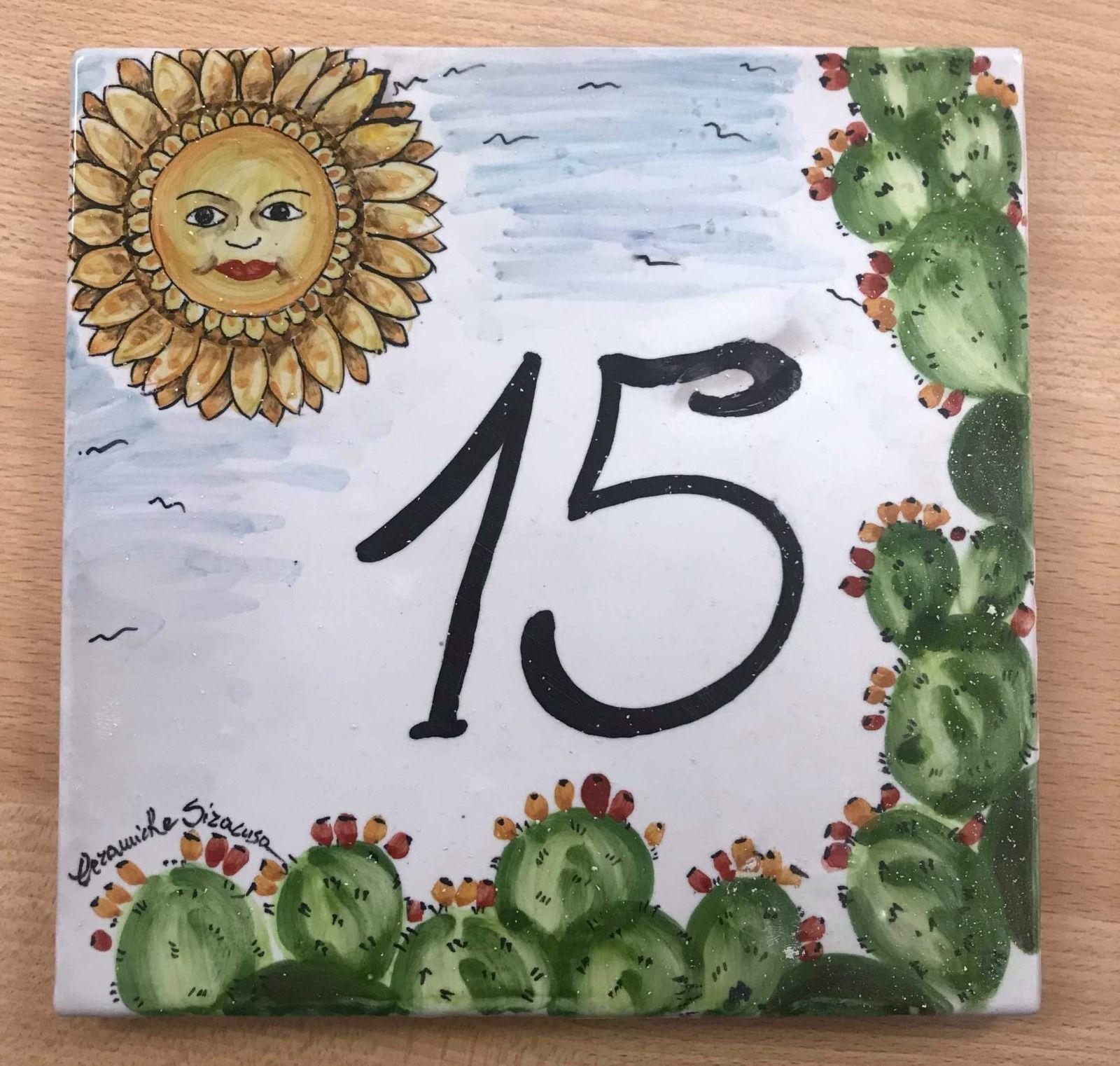 Insegna in ceramica: