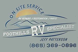 Business card for Foothills RV Specialist. Includes logo of sun over mountains, phone number, and name.