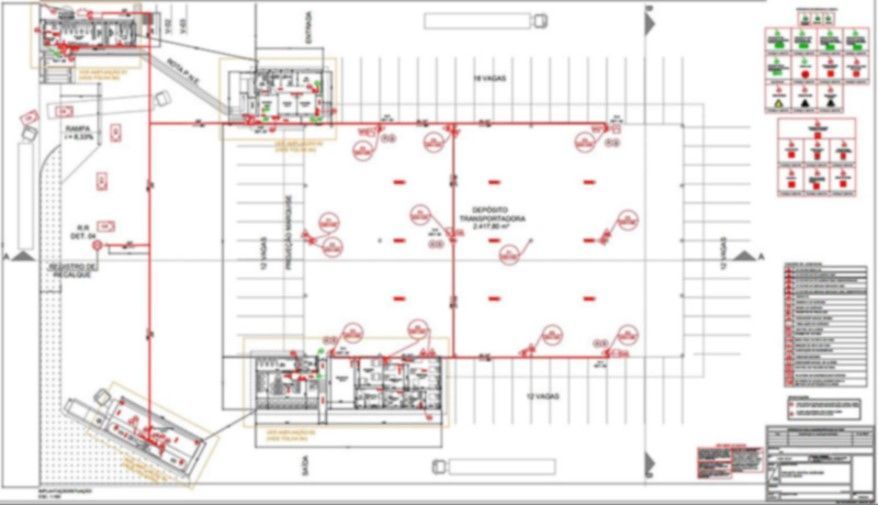 Uma planta baixa de um edifício com muitas linhas vermelhas