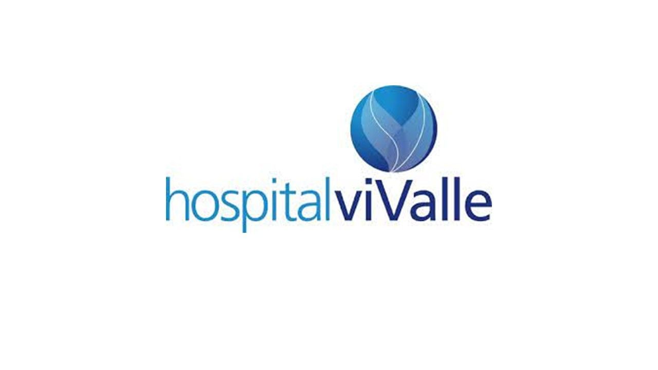 O logotipo do hospital vivalle é azul e branco e tem um círculo azul no meio.