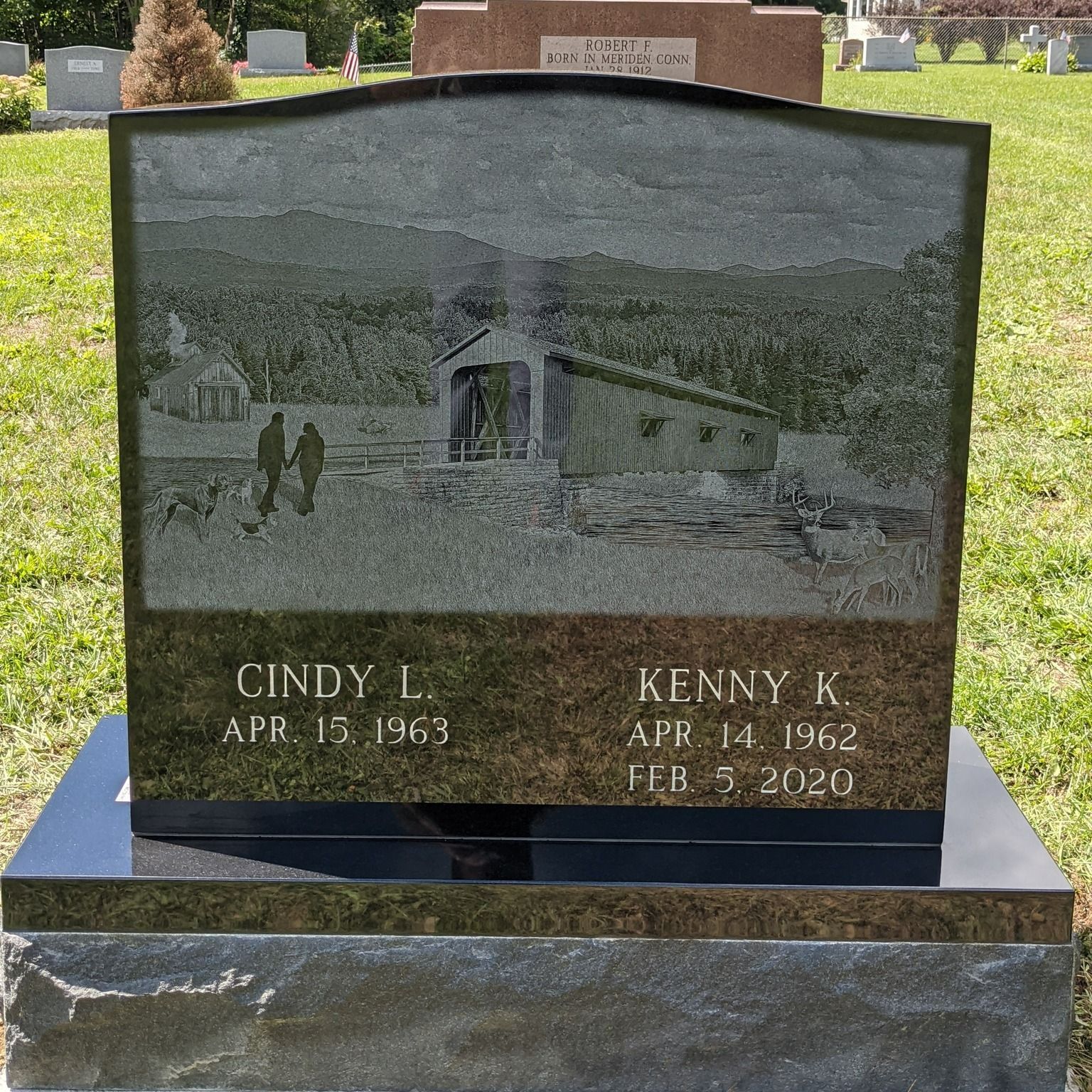 A gravestone for cindy l. and kenny k. in a cemetery