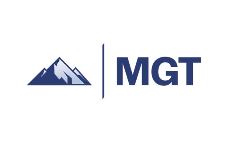 MGT logo with dark blue mountain icon and bold blue letters separated by a vertical line