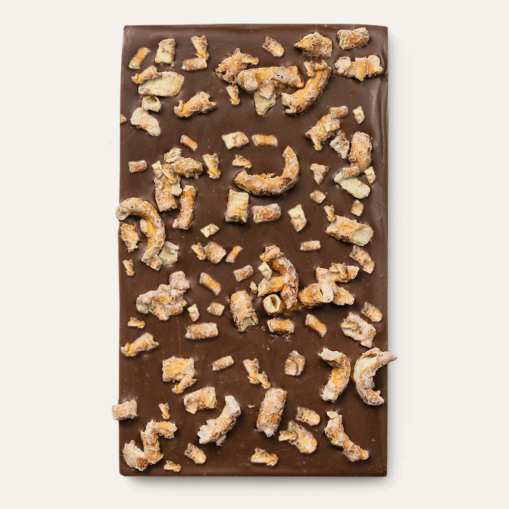 milk chocolate bar with peanut and pretzel toppings