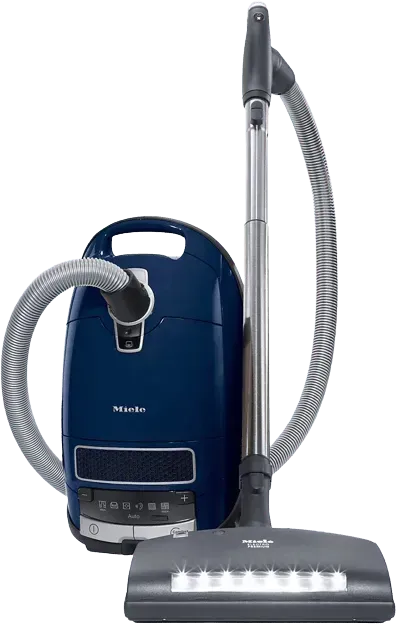 Blue canister vacuum cleaner with hose, wand, and floor head on white background