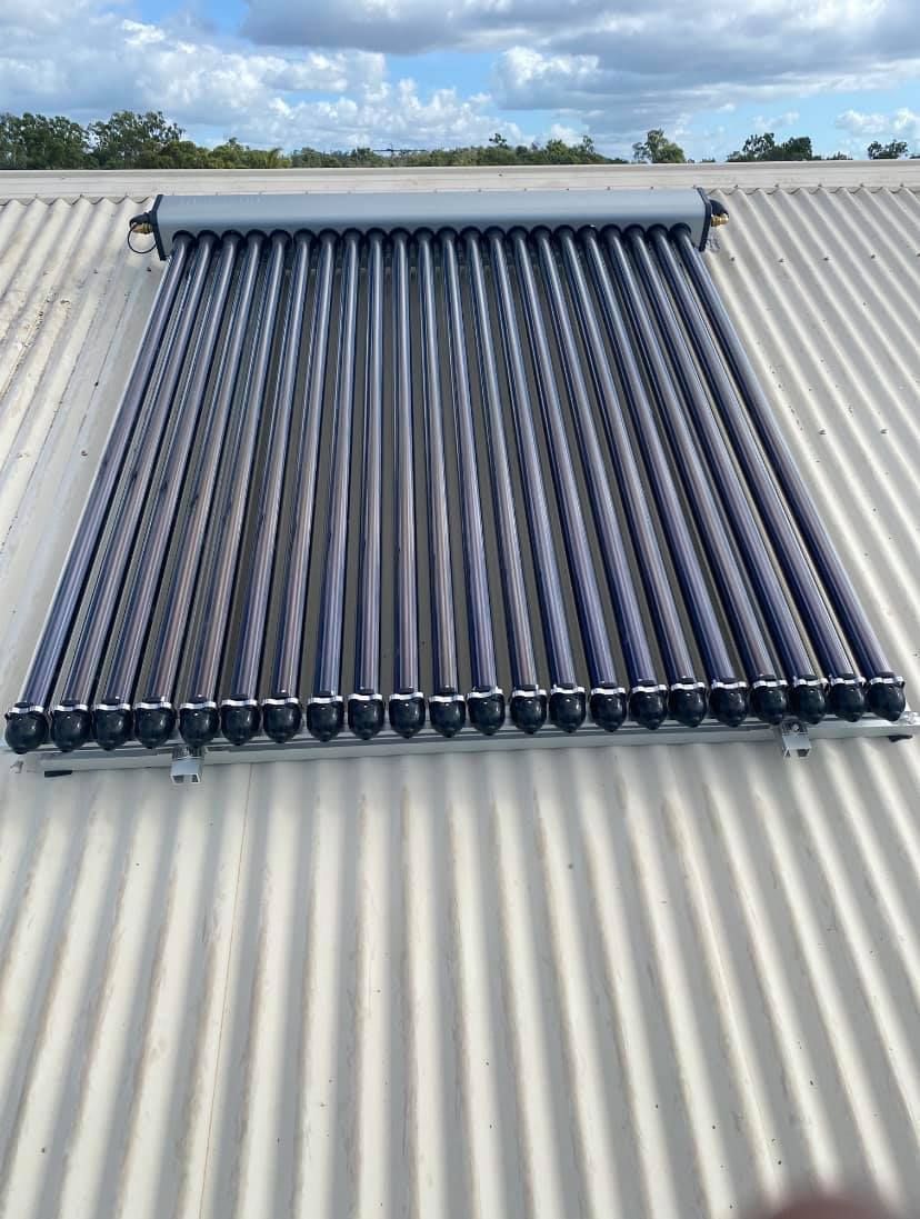 Solar Thermal Tubes on a Corrugated Metal Roof — Top To Bottom Plumbing in Garbutt, QLD
