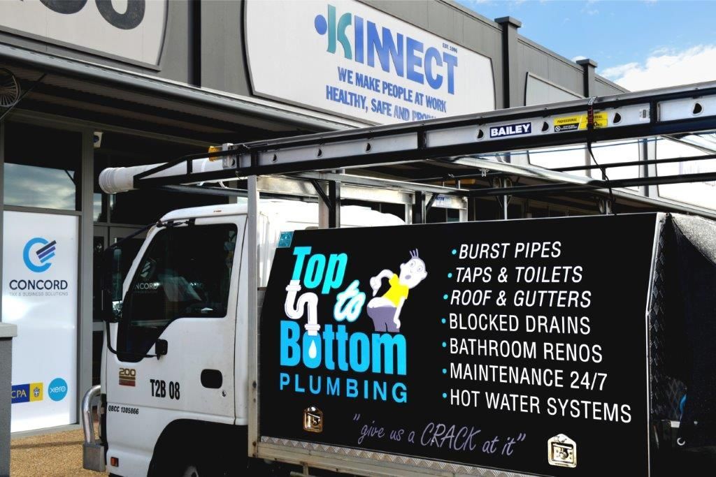 A Roof with A Lot of Solar Panels on It — Top To Bottom Plumbing in Garbutt, QLD