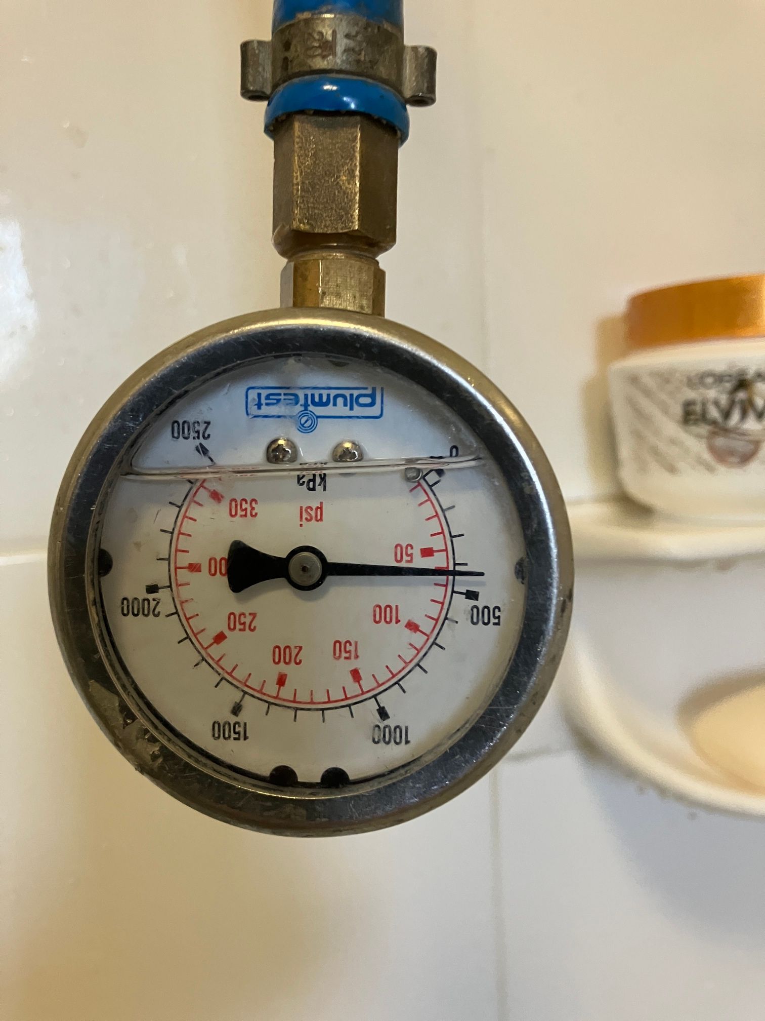 A Close up Of a Valve and A Pressure Gauge on A Pipe — Top To Bottom Plumbing in Garbutt, QLD