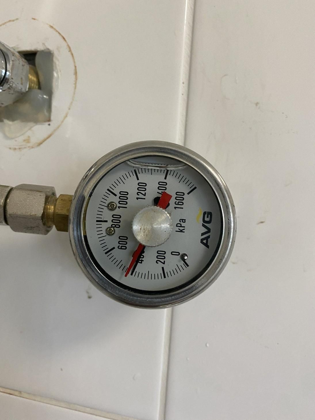 A Pressure Gauge Is Attached to A Valve on A Wall — Top To Bottom Plumbing in Garbutt, QLD