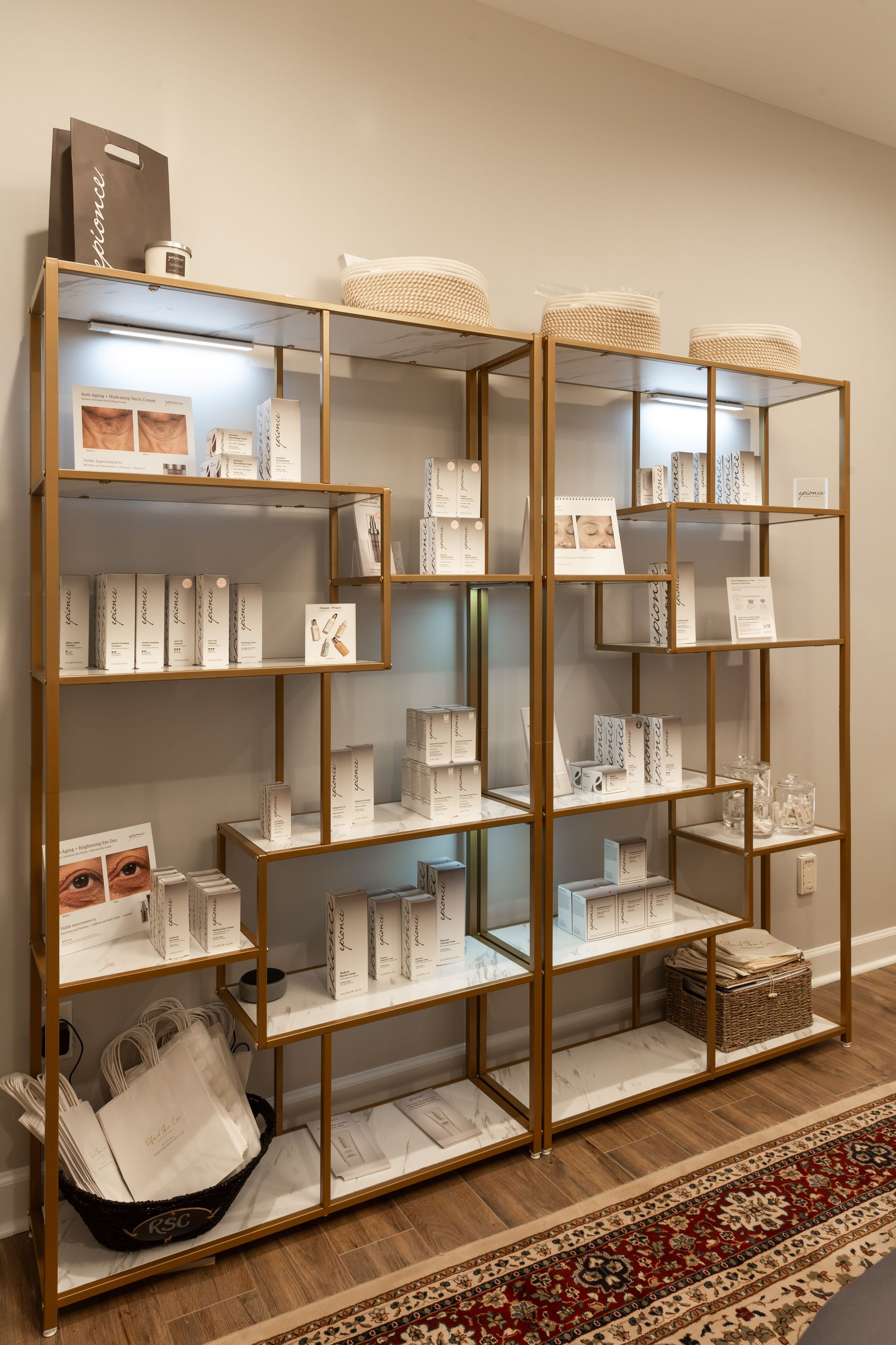 A row of shelves filled with lots of items in a room.