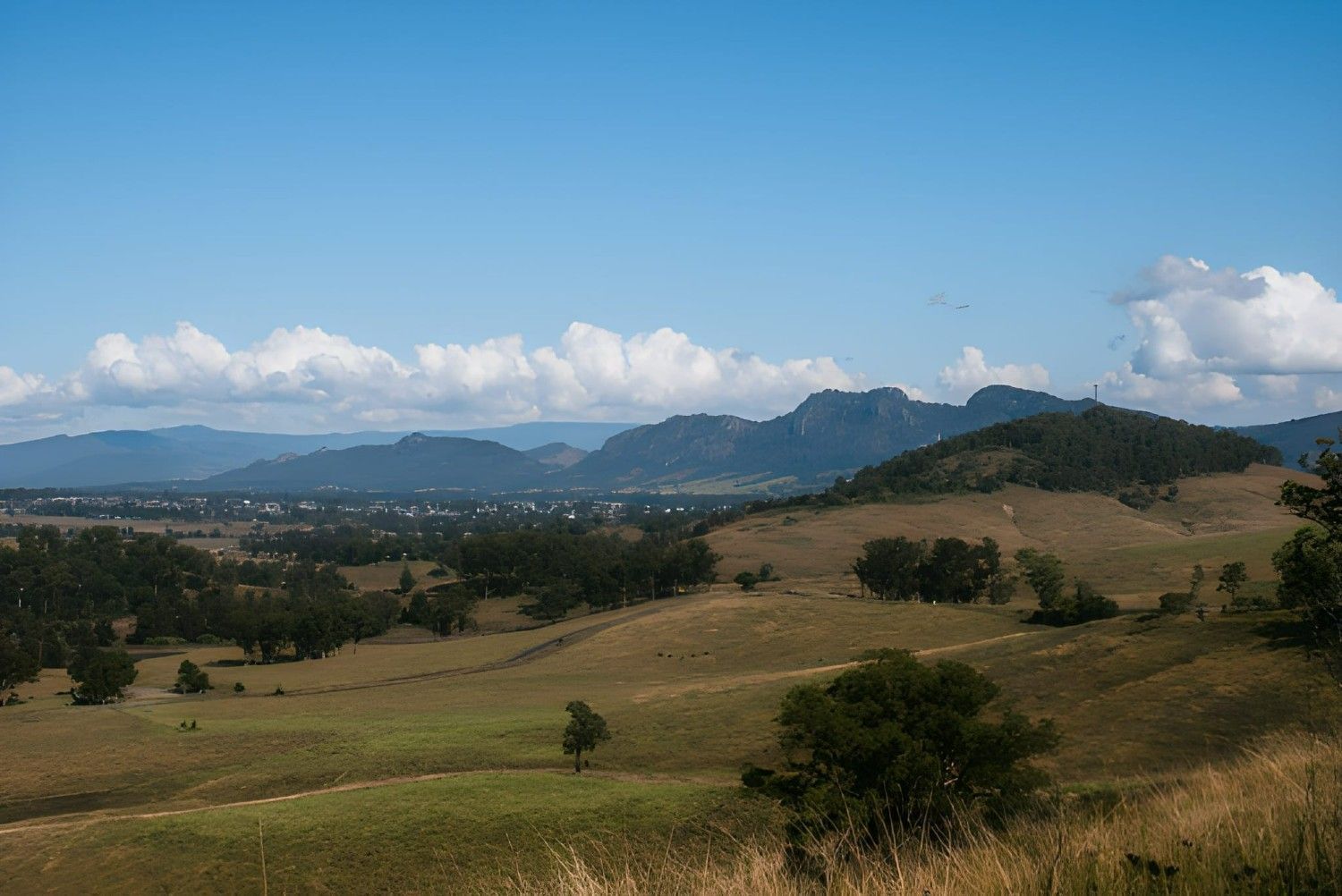 A Rolling Hills Under a Blue Sky — Barry Brown Rural Contracting Service in Gloucester, NSW