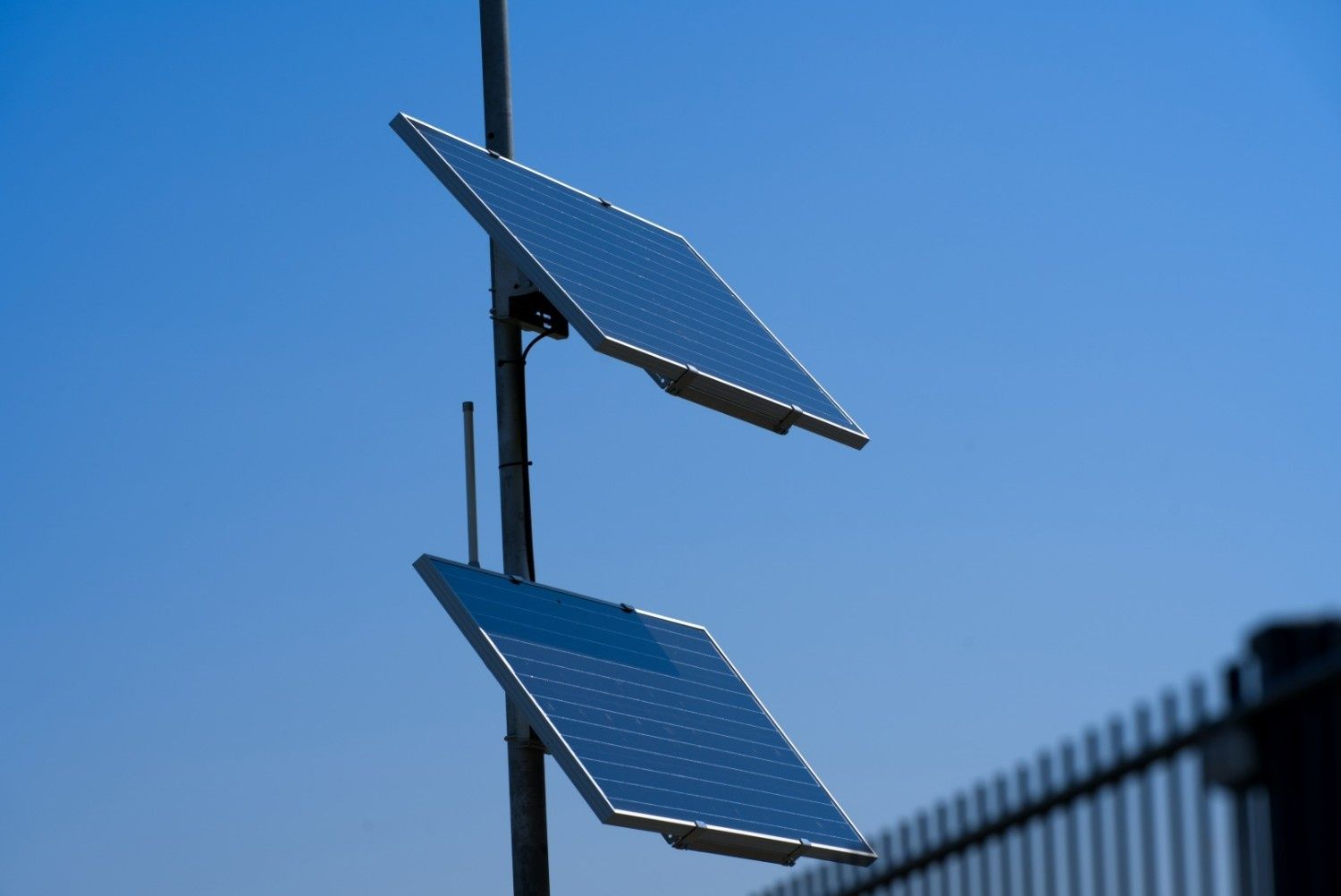Two Solar Panels Mounted on A Pole — Barry Brown Rural Contracting Service in Tinonee, NSW