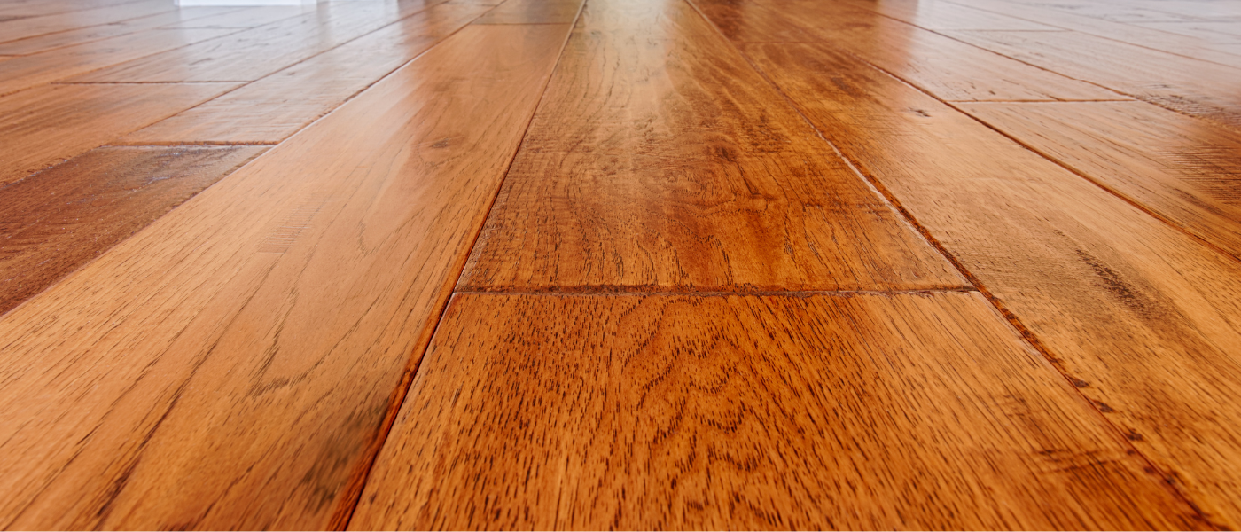 photo of a hardwood floor that has had water popping done to it 