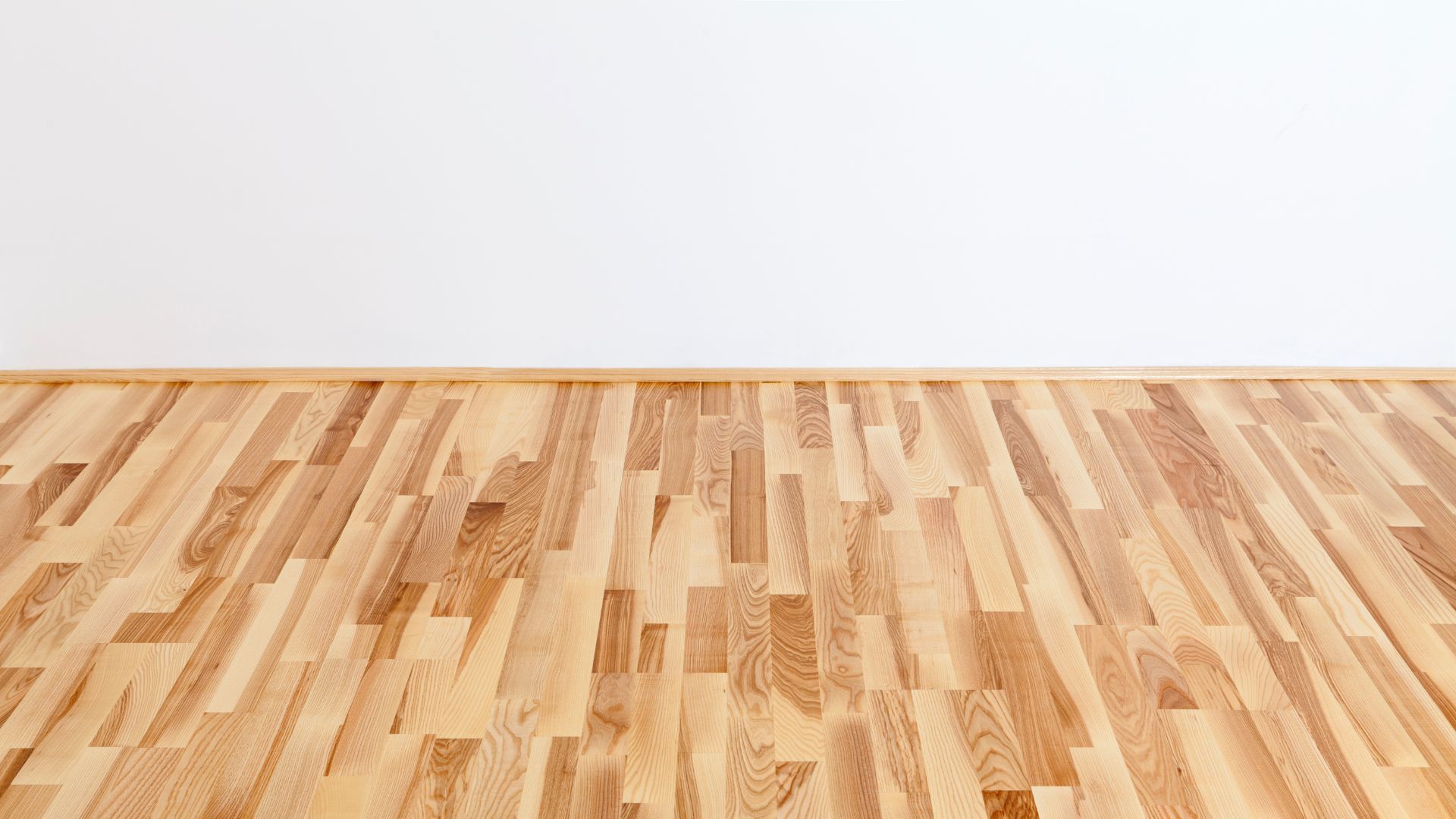 Polished hardwood floor with natural wood grain pattern in a home in Athens, GA.