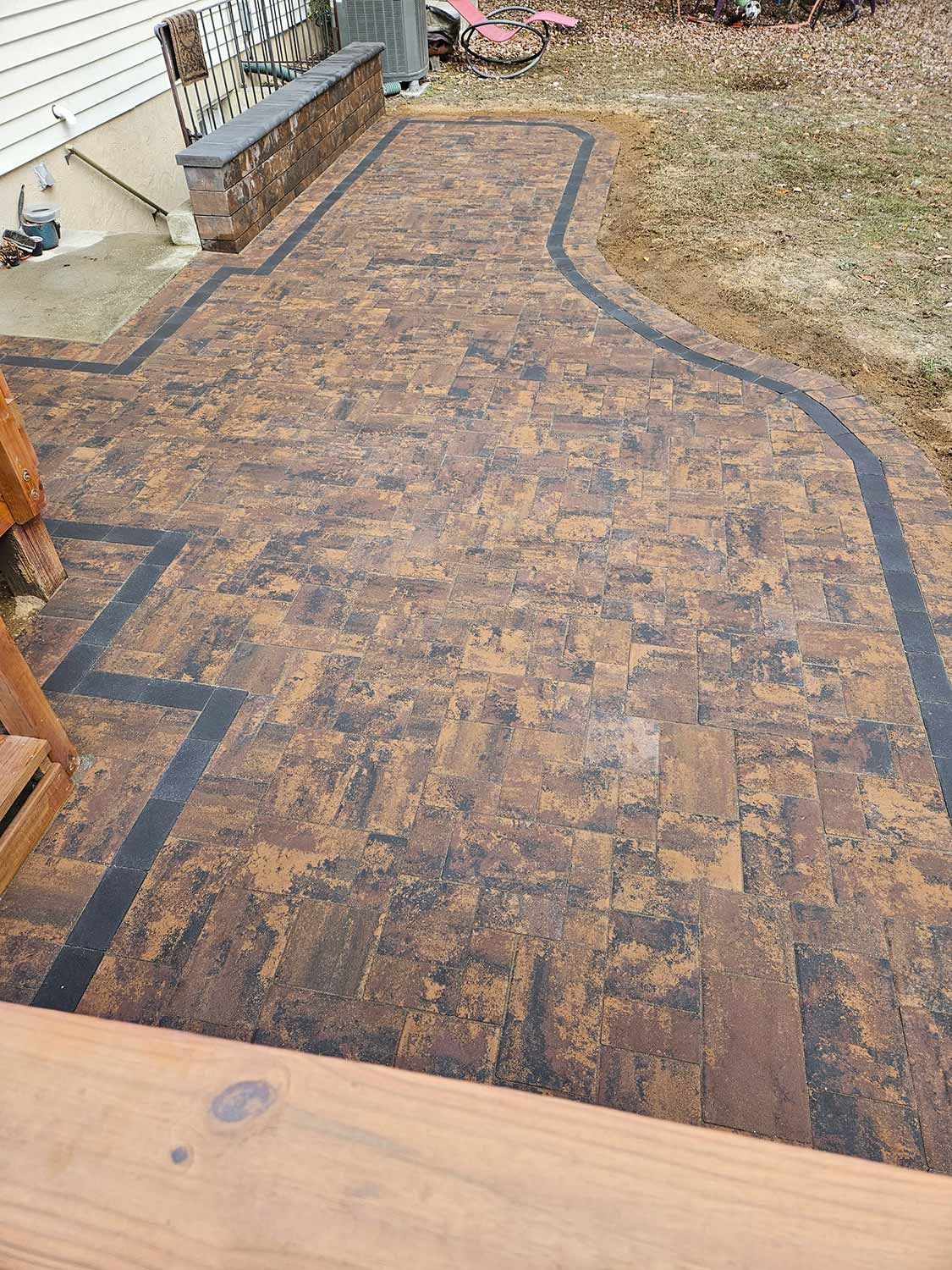 Brick Walkway in a Backyard