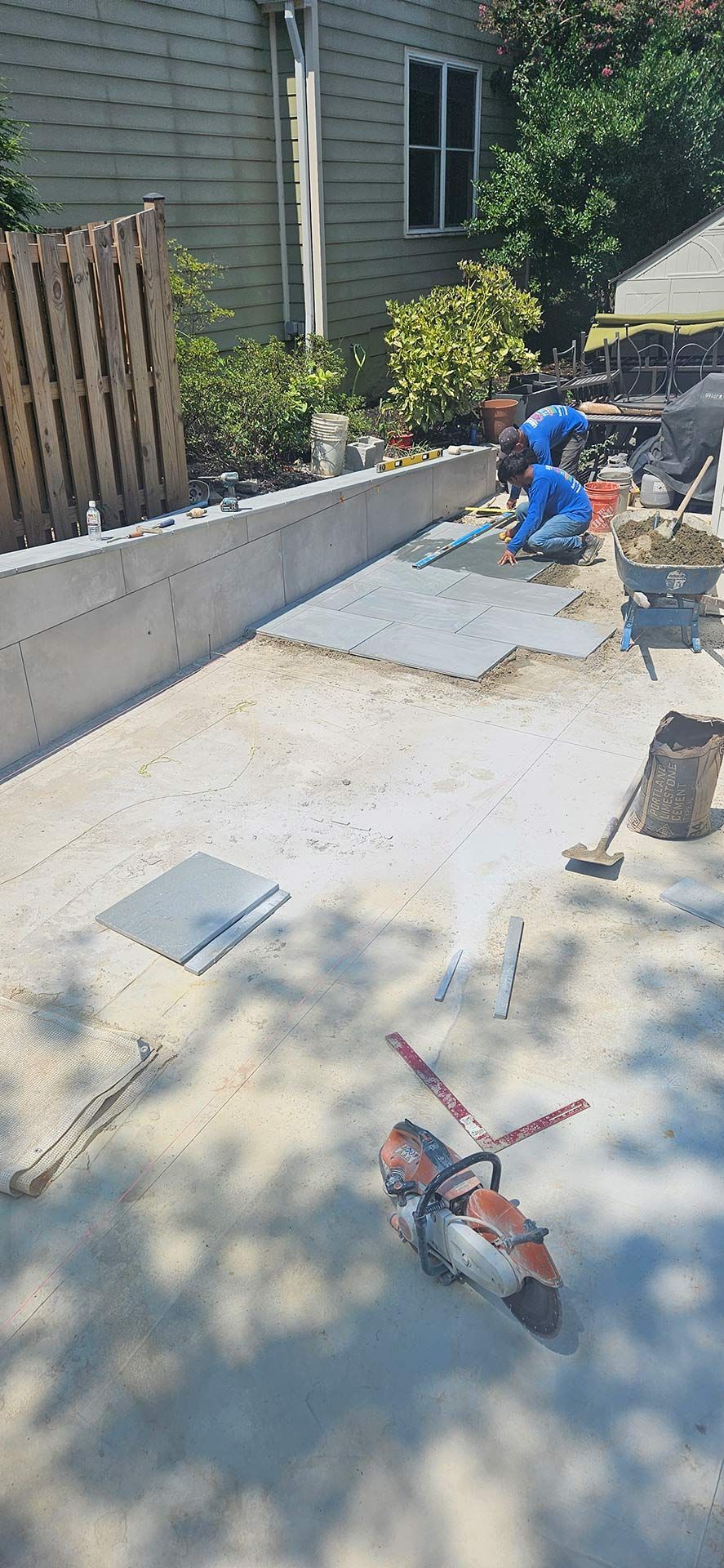 Workers Constructing a Patio