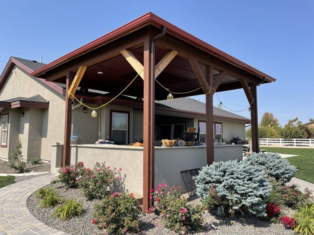 A house with a covered porch in front of it