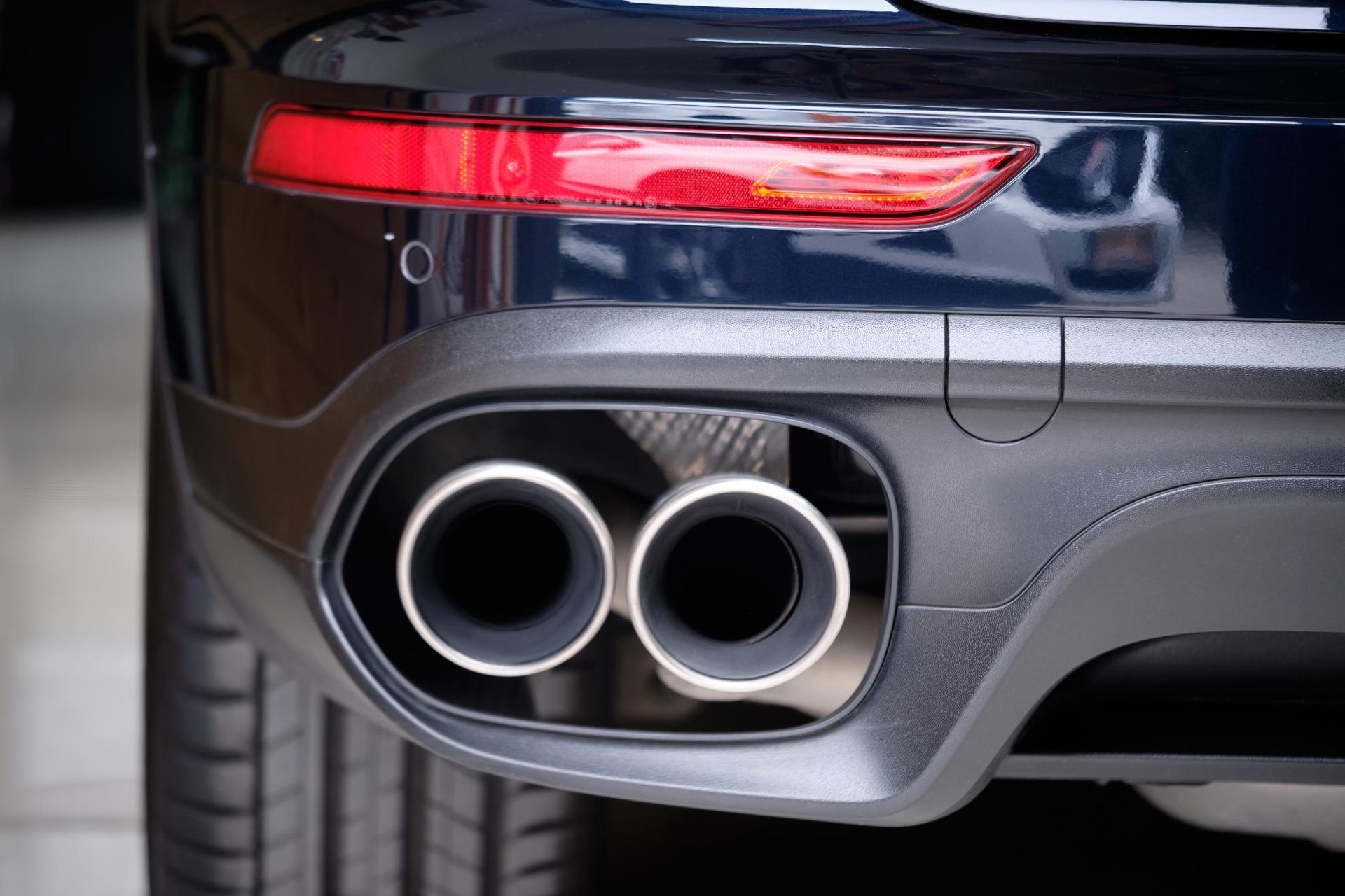 A close up of the exhaust pipes of a car.