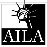 AILA logo: Statue of Liberty's head with the letters AILA in a black and white design.