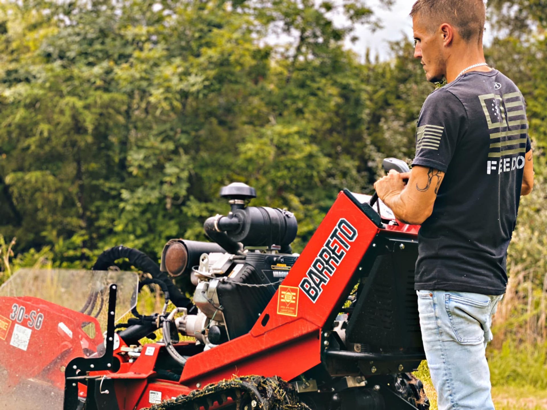 A man in a black shirt with the word field on it