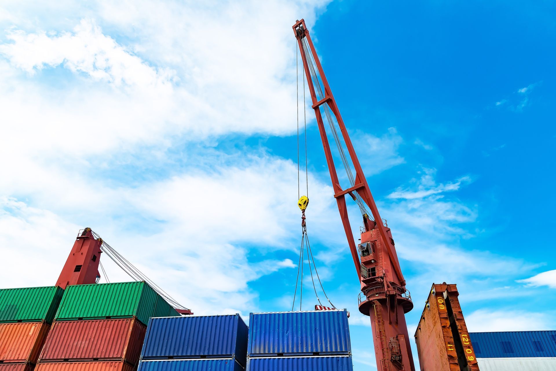 Loading containers with a crane. Loading containers with a crane.