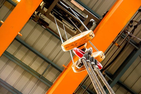 Orange Crane Pulley Over — Carroll OH — Buckeye Crane & Hoist Orange Crane Pulley Over — Carroll OH — Buckeye Crane & Hoist
