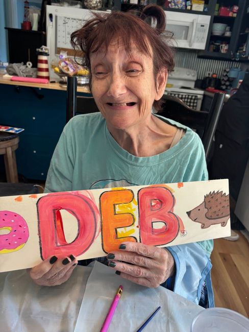 Woman holding sign 
