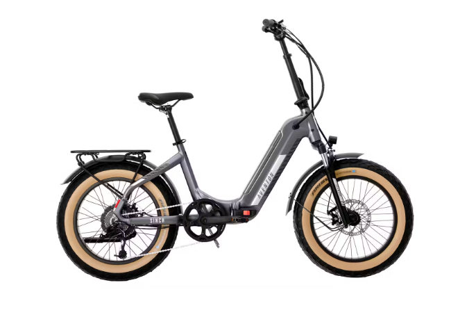 A gray folding electric bike with brown tires on a white background.