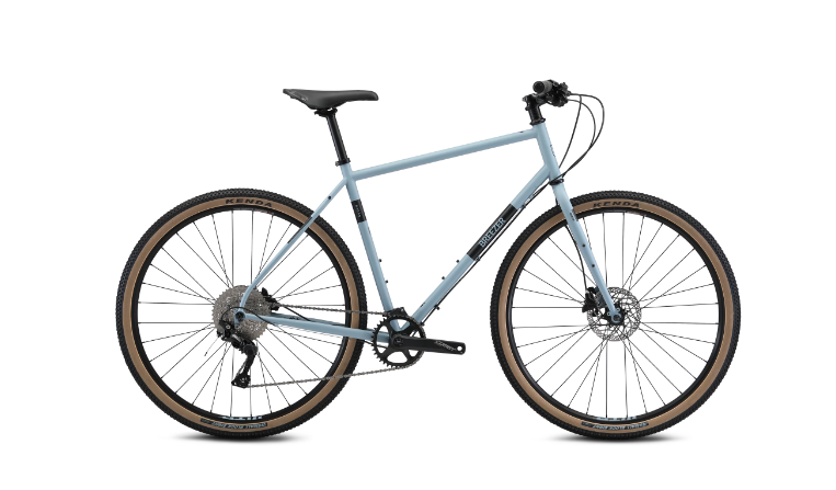 A blue bicycle with brown tires on a white background.