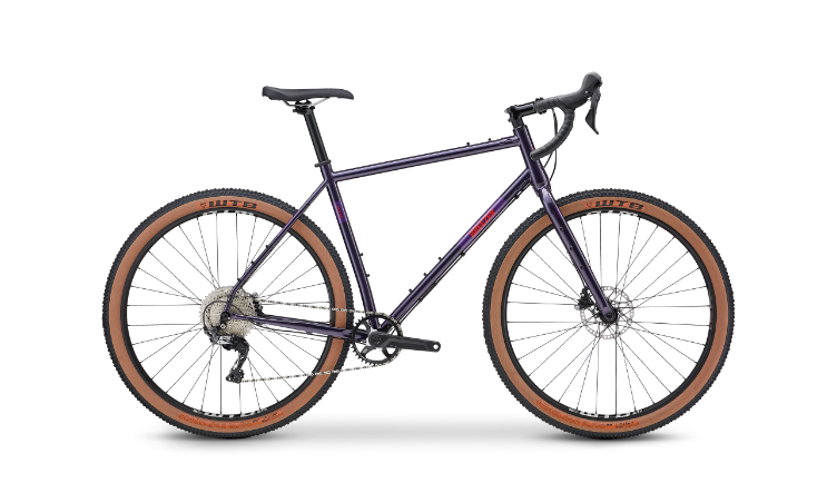A purple bicycle with brown wheels and tires on a white background.