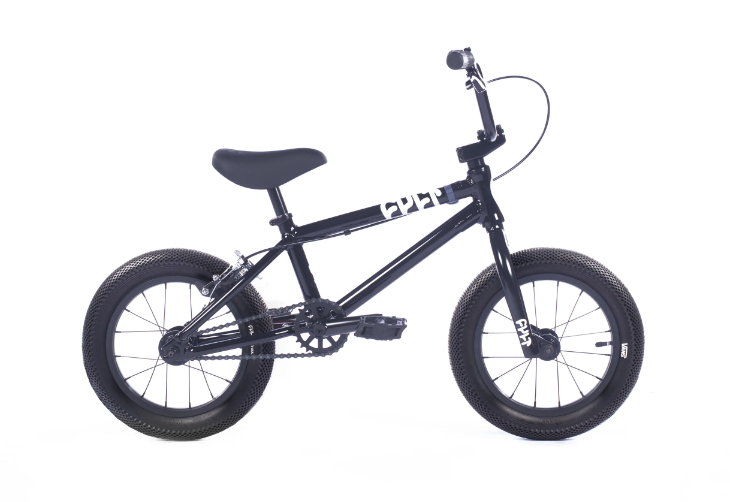 A black bmx bike is on a white background.