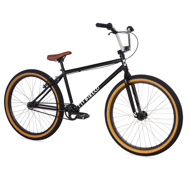 A black bmx bike with yellow tires on a white background.