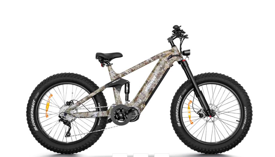 A camouflage bicycle with large tires on a white background.
