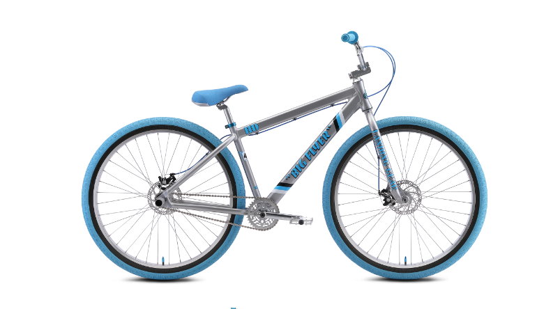 A gray and blue bicycle with blue tires on a white background.